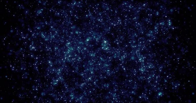 Abstract background of blue glowing shiny digital flying dots of particles that look like stars in a galaxy in space. Screensaver beautiful video animation in high resolution 4k