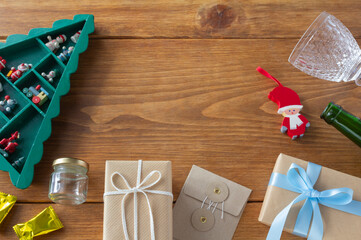 Christmas decorations and Christmas gift frames placed on a wooden desk	