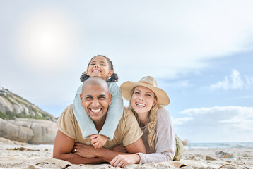 Family, diversity and lying at beach, smile or portrait to relax, together and sun by sea for happiness. Woman, black man and child on vacation, holiday or travel to ocean, family and happy in summer