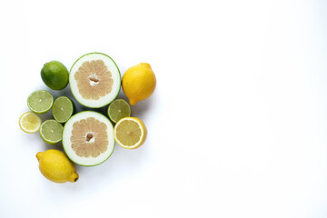 lime, lemon and grapefruit on a white background