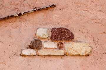 Bricks in a light pink wall
