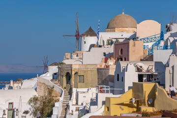 Colorful buildings on a hillside at Oia town on Santorini island in Greece