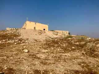 Irbid, Jordan, November 2019 - A castle on top of a grass covered field