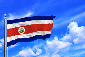 Fototapeta na wymiar Costa Rica Flag Waving In The Wind On A Beautiful Summer Blue Sky
