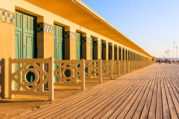 Deauville seaside resort. Normandy, France. Promenade des Planches(Boardwalk).