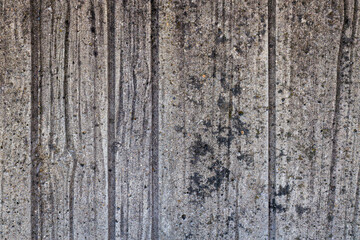 Fototapeta premium close up texture of rough stone wall with moss growing, abstract pattern background