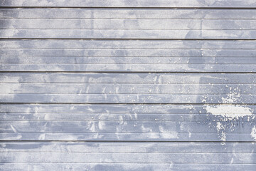 badly painted, gray and white garage door, abstract background pattern