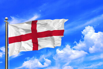 Fototapeta na wymiar England Flag Waving In The Wind On A Beautiful Summer Blue Sky