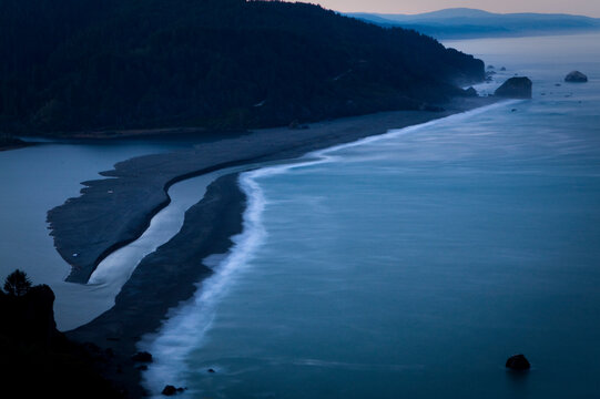 The Mouth Of The Klamath River Entering The Pacific Ocean In Northern California.