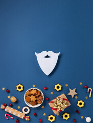 Saint Nicholas Day Festive Card. Holiday Sweets and White Santa Claus Beard on Blue Background