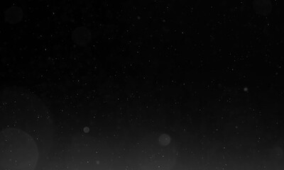 Falling snow isolated on black background