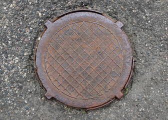 manhole cover in the street