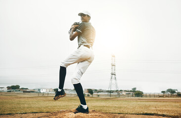 Baseball player, pitch and sports athlete man outdoor on a field with focus and fitness. Game...