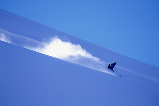 Man skiing powder at Pemberton, British Columbia, Canada.