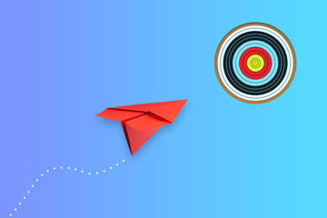 Red paper plane flies to the target, on a blue background. The concept of achieving the goal. success. Business. Lifestyle.