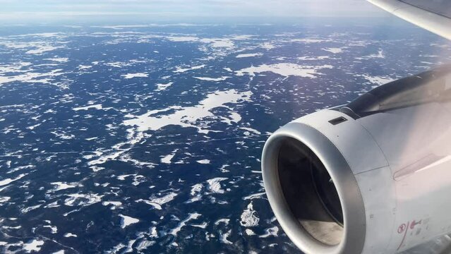 View from airplane windows during landing at Helsinki airport, Finland