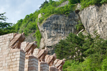 Obraz premium Inscription of words on Monte Sardagna in Trento, Italy