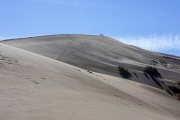 The Singing dune is 3 km long and 150 m high. Altyn-Emel National Park, Kazakhstan. - obrazy, fototapety, plakaty
