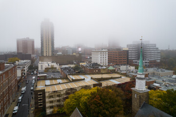 Fototapeta na wymiar Morning fog in an urban town 