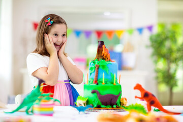 Kids birthday party. Dinosaur theme cake.