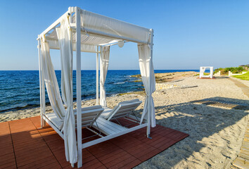 Luxury sunbeds on Greek sea coast