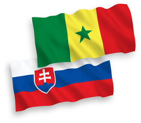 National vector fabric wave flags of Slovakia and Republic of Senegal isolated on white background. 1 to 2 proportion.