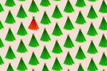 Obraz premium Colorful seamless pattern made of small childish origami Christmas tree with a star on its top. Creative Xmas and New year craft idea.