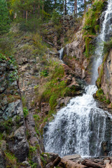 Kamyshlinsky waterfall, vertical photo. Siberian landscape
