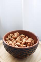 cashew nuts in a bowl on table 