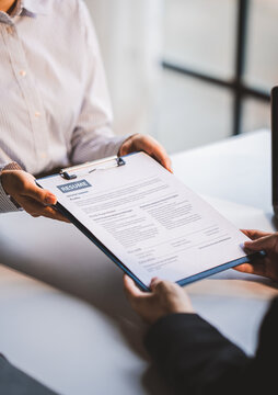 Portrait of a person interviewing for a job and.Submit resume to staff job application concept