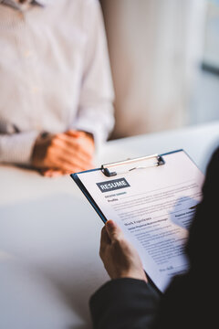 Portrait of a person interviewing for a job and.Submit resume to staff job application concept