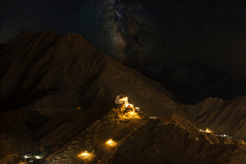 Nightsky with Namgyal Tsemo Gompa, main buddhist monastery centre in Leh, Ladakh, India