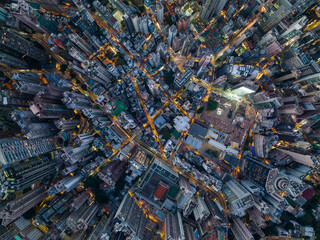 Top down view of the compact city in central of Hong Kong in the evening