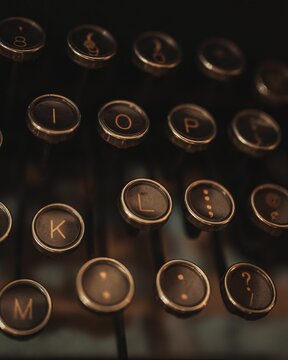 Closeup of the vintage typewriter buttons, a vertical shot
