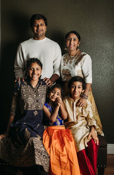 Diwali Family portrait wearing traditional attire 
