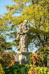 The late Baroque stone statue of Virgin Mary in the churchyard erected around 1800 in Dormand, Heves, Hungary