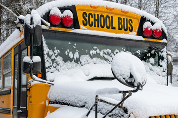 Snow Covered Parked Chrome Yellow School Bus - obrazy, fototapety, plakaty