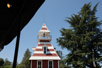Sunlight shines on the historic 1891 public Fire House in downtown Auburn, California, USA.