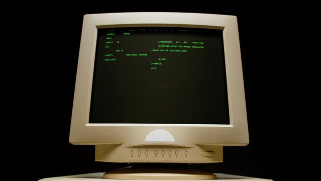 Retro pc with loading code console, programmer making scripts, green basic screen, Old computer studio close-up, Desktop vintage retro wave display, late 90s PC.
