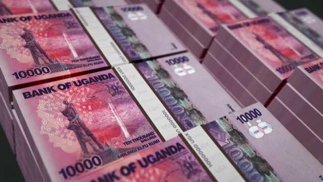 Uganda money Shilling money pack loop 3d animation. Loopable seamless concept of finance, cash, economy, business and bank. Camera moving over the 10000 UGX banknote bundle stacks.
