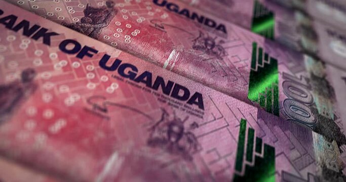Uganda money Shilling banknote loop. UGX money texture. Concept of economy, business, crisis, banking, recession, debt and finance. Moving over note. Loopable seamless 3d animation.