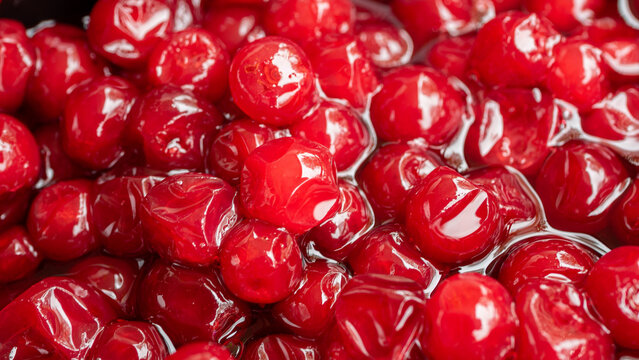 Highly detailed, and bright red close up of lingonberry jam. The berries are grown in the wild and usually harvested late summer, early autumn. 