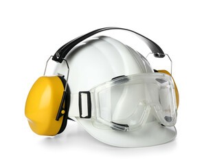 Hearing protectors with hardhat and safety goggles on white background