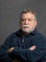 Fototapeta premium Studio portrait of senior caucasian man with mustaches