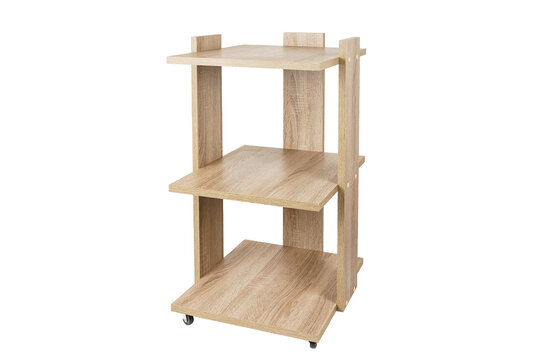 Cabinet or shelving unit on wheels with shelves on a white isolated background. Wooden chipboard.