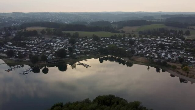 Drone Shot of a German water lake Bevertalsperre in dusk