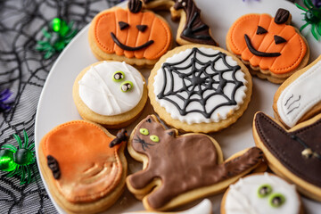halloween dessert sweet baked trick or treat cookies, cake, bisquits shaped pumpkin, ghost, with,  - 541067716