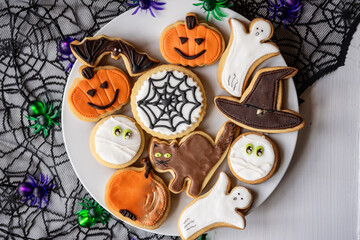halloween dessert sweet baked trick or treat cookies, cake, bisquits shaped pumpkin, ghost, with,  - 541067734