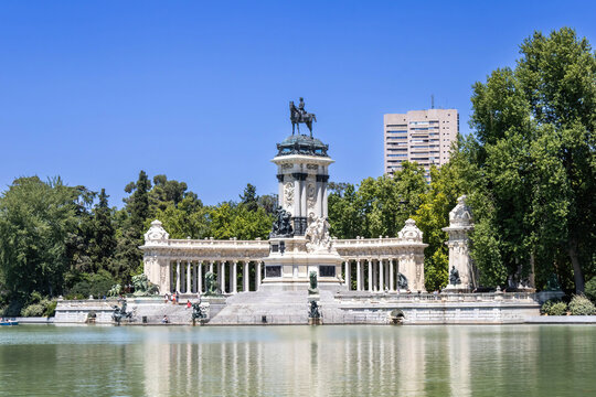 Monument to Alfonso XII, colonnade and Great Pond in El Retiro Park, Madrid, Spain