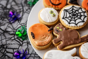 halloween dessert sweet baked trick or treat cookies, cake, bisquits shaped pumpkin, ghost, with,  - 541068567